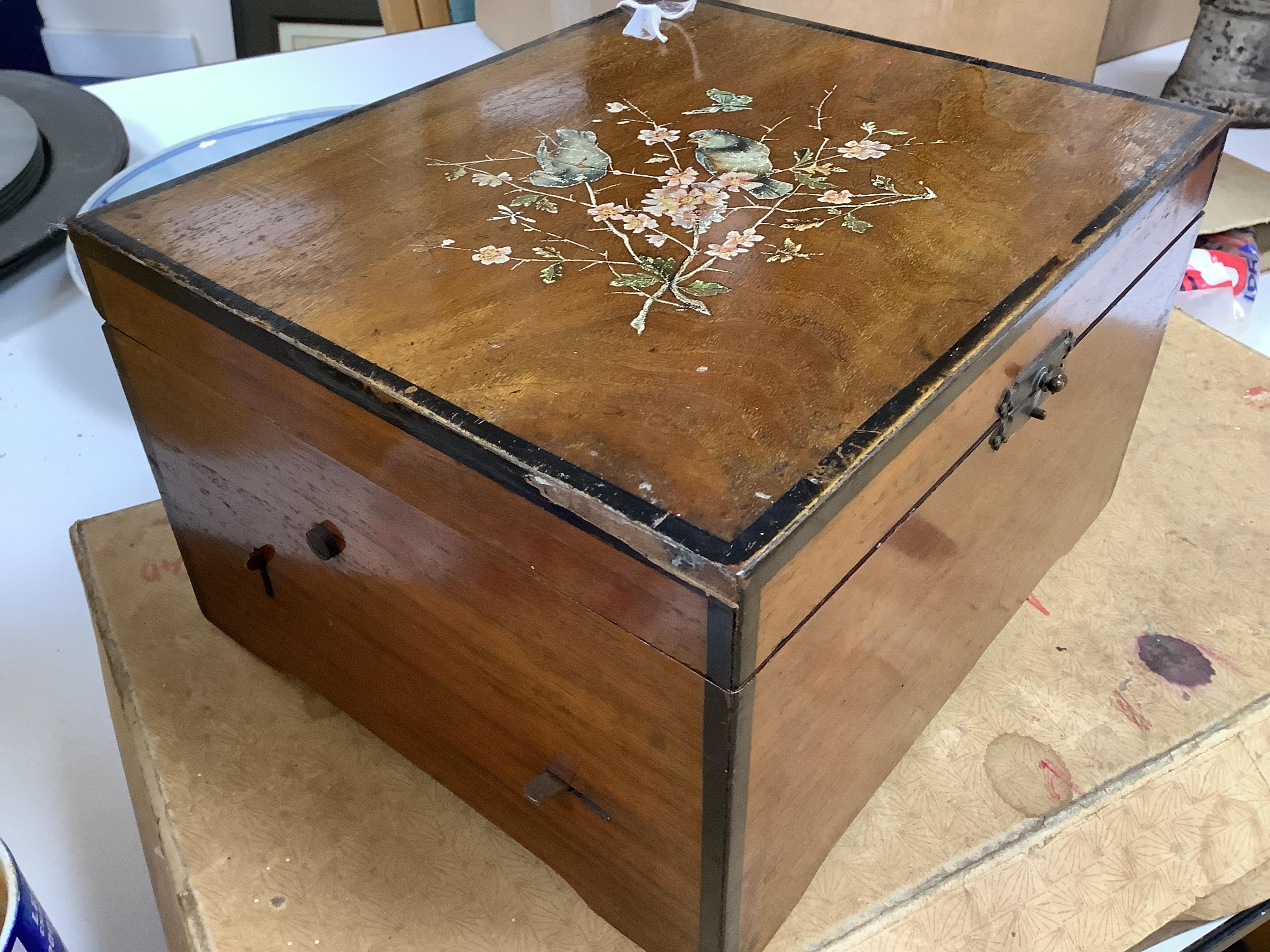 A late 19th century Monopol disc music box in a mahogany case, to play discs 19cm diameter, together with twelve discs, plus an ebonised ‘Chord-Harps’ zither in its original card box with tuning hammer.